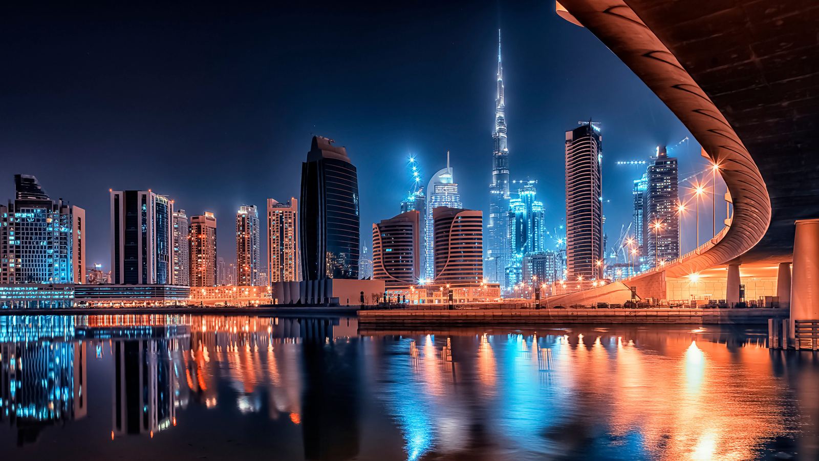 Business Bay skyline across the Dubai Canal at night