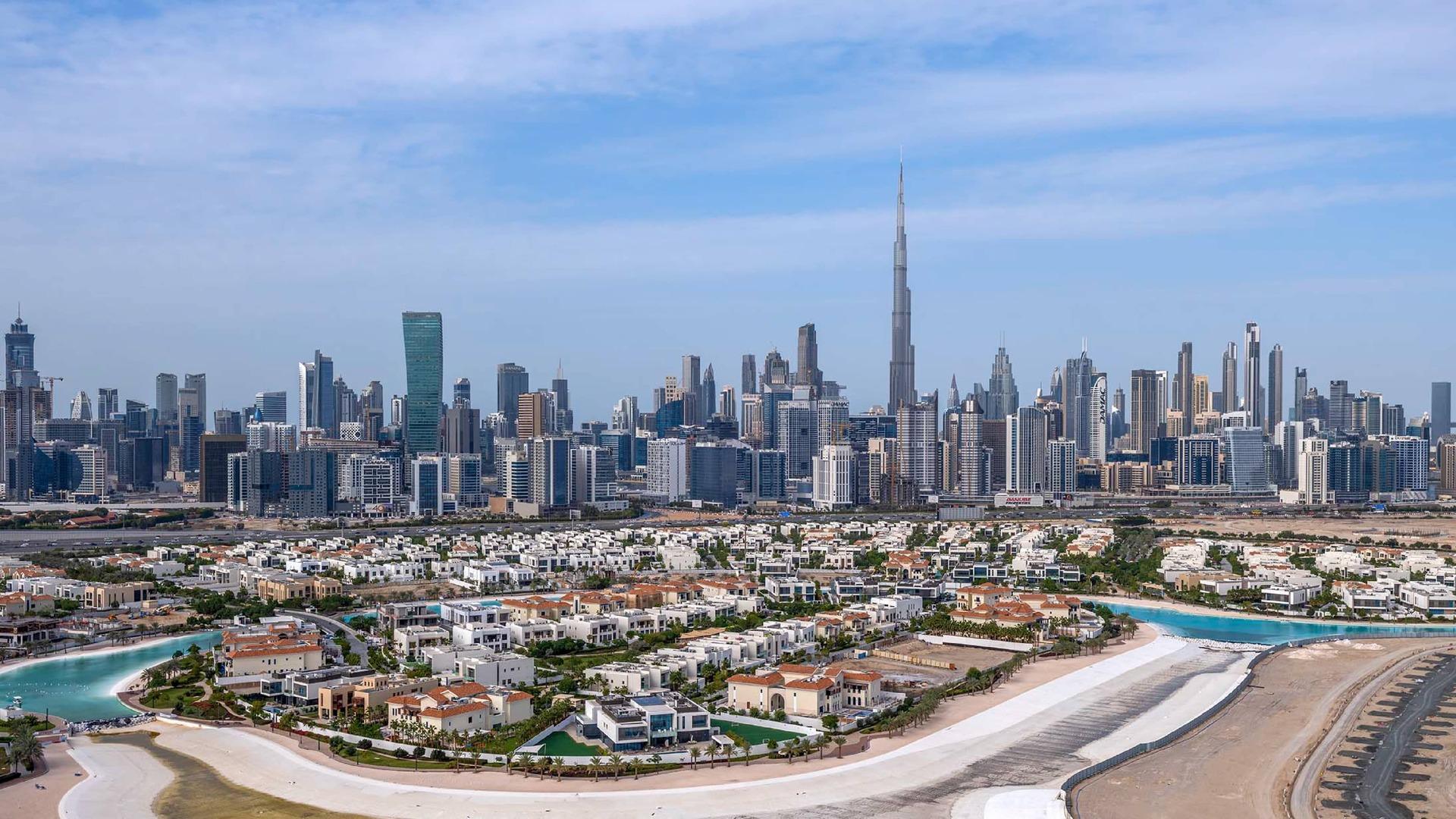 Palm Jumeirah villas with the Dubai skyline beyond